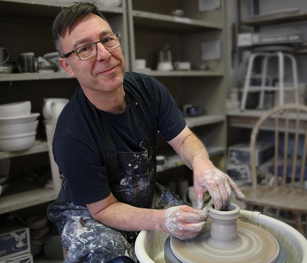 Paul Stewart creating pottery.